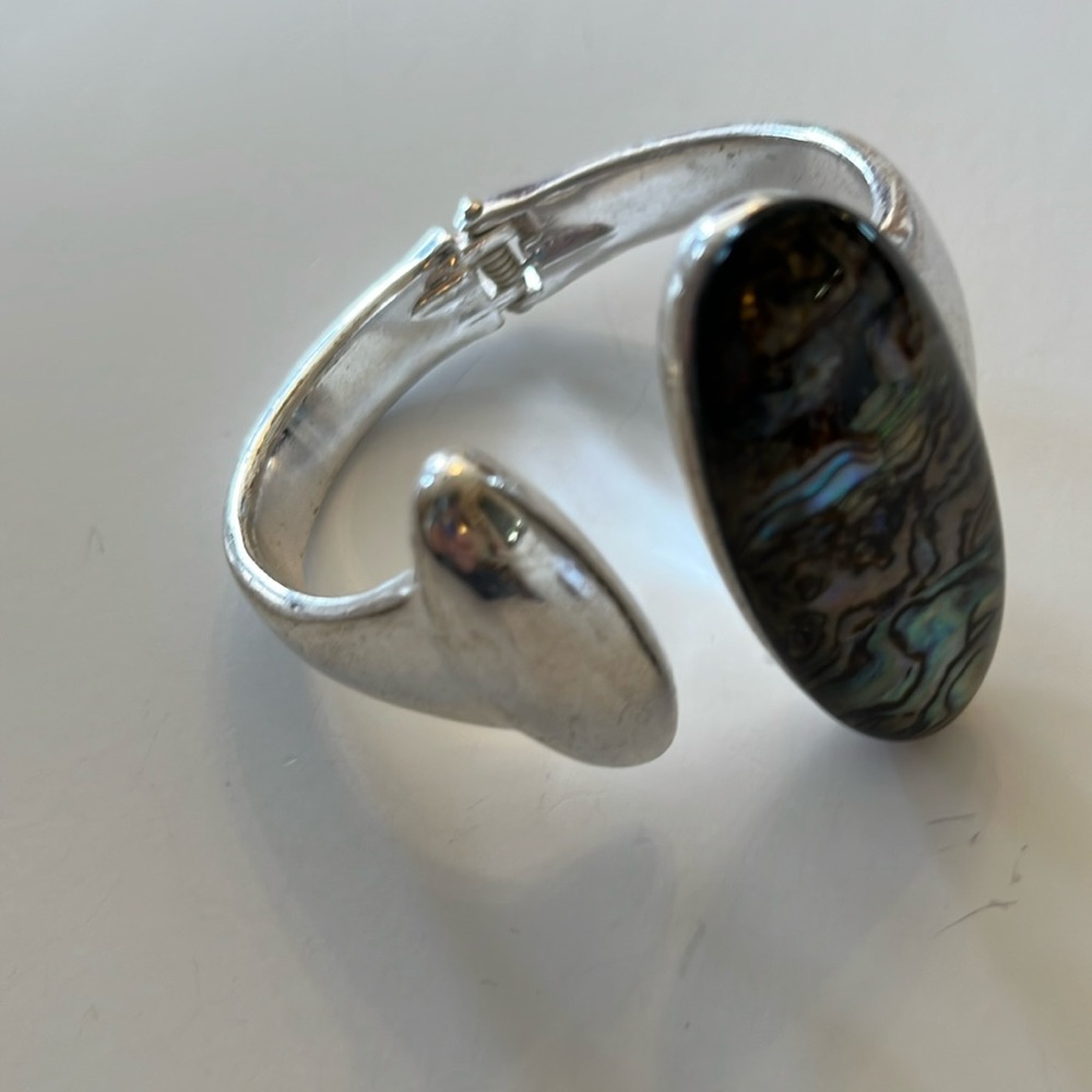 Robert Lee Morris bracelet. Silver toned with black tan aqua color center accent